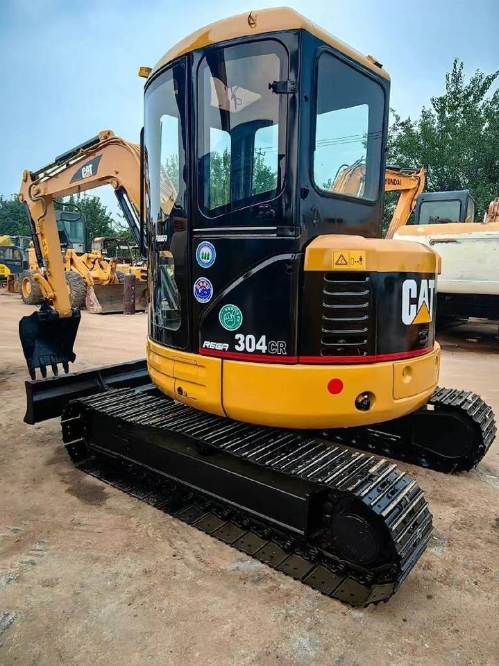 CAT 304 - Мини-экскаватор: фото 1 CAT 304 - Мини-экскаватор: фото 1