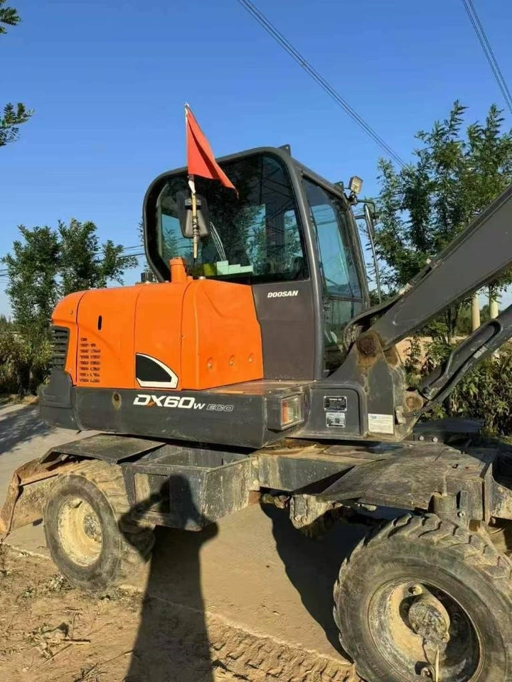 Doosan DX60W - Колёсный экскаватор: фото 5 Doosan DX60W - Колёсный экскаватор: фото 5