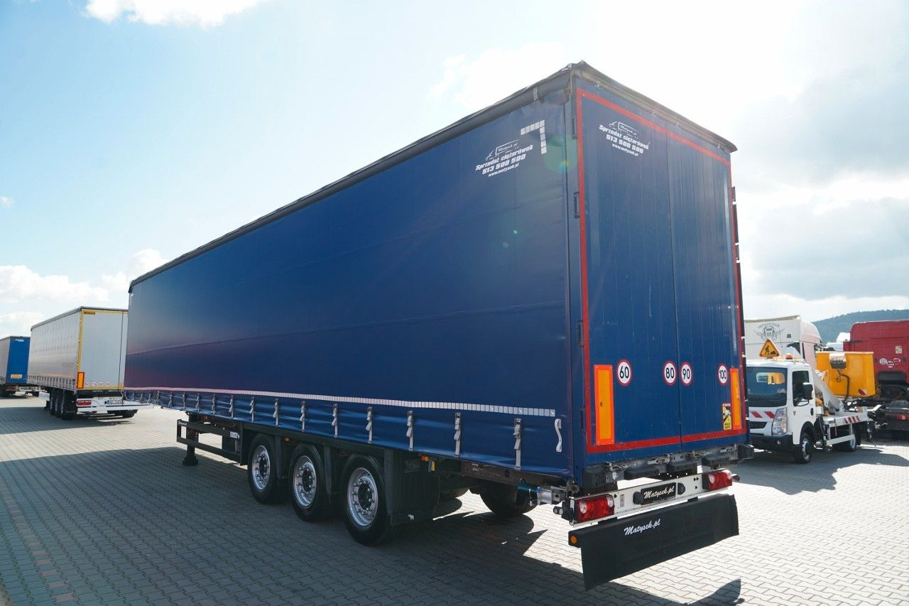 Schmitz Cargobull FIRANKA VARIOS / PODNOSZONY DACH / OPONY 385/55 - Тентованный полуприцеп: фото 5 Schmitz Cargobull FIRANKA VARIOS / PODNOSZONY DACH / OPONY 385/55 - Тентованный полуприцеп: фото 5