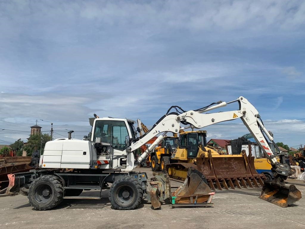 Liebherr A 311 Litronic - Колёсный экскаватор: фото 3 Liebherr A 311 Litronic - Колёсный экскаватор: фото 3