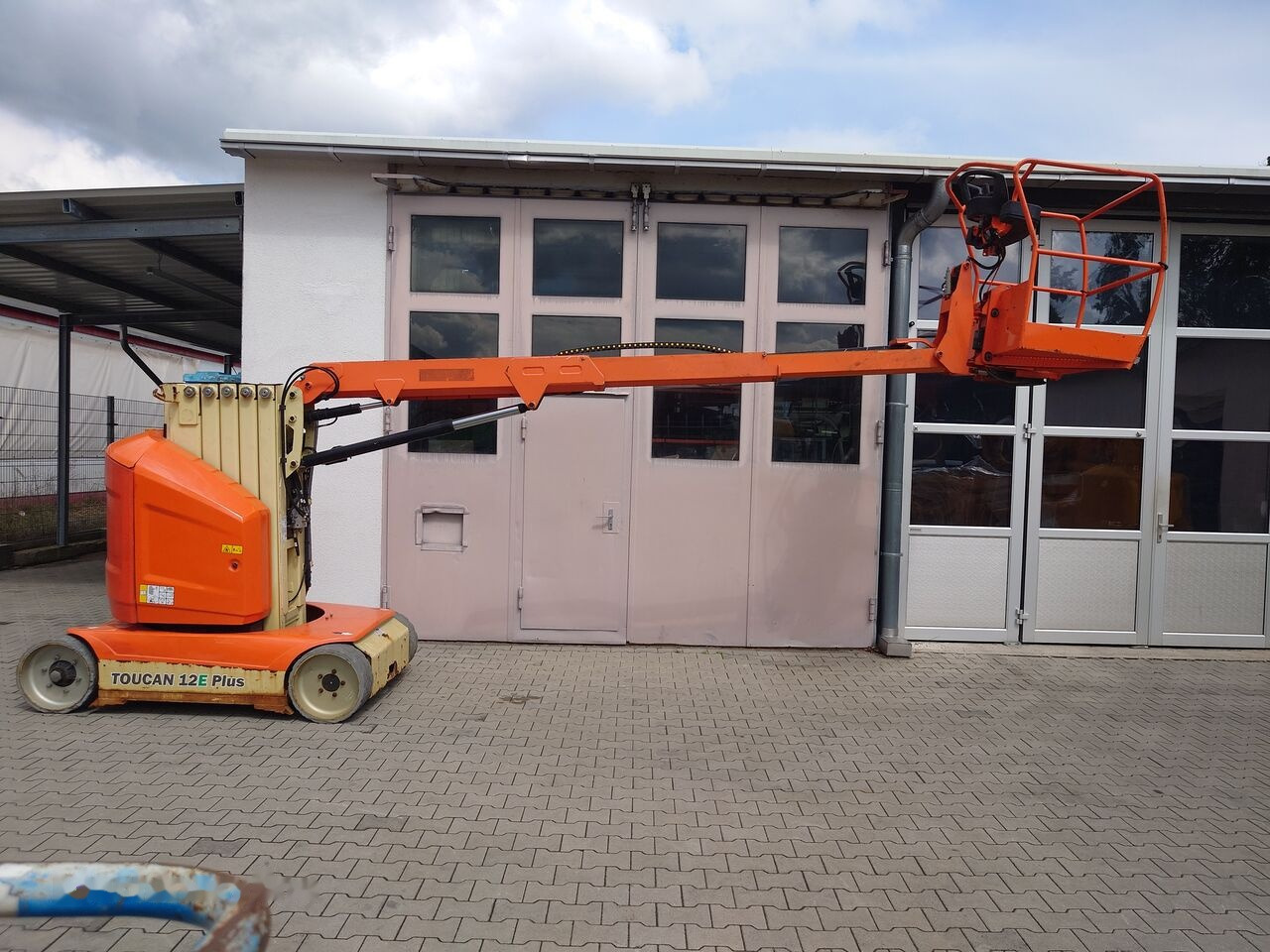 JLG TOUCAN 12E PLUS - Вертикальный мачтовый подъемник: фото 1 JLG TOUCAN 12E PLUS - Вертикальный мачтовый подъемник: фото 1