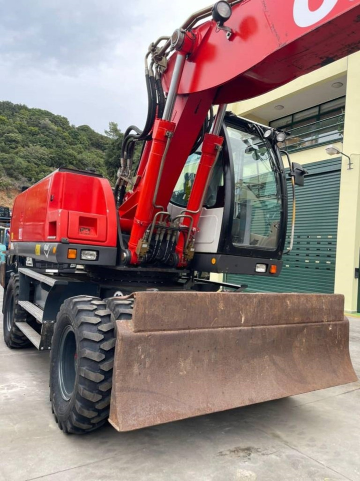 Колёсный экскаватор O&K MH 6.6: фото 20