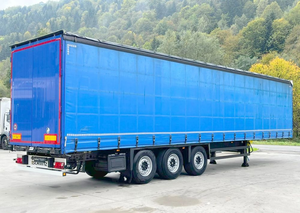 Schmitz Cargobull Firanka Standard Coilmulde // 9m // Oś podnoszona // Osie Schmitz // - Тентованный полуприцеп: фото 1 Schmitz Cargobull Firanka Standard Coilmulde // 9m // Oś podnoszona // Osie Schmitz // - Тентованный полуприцеп: фото 1