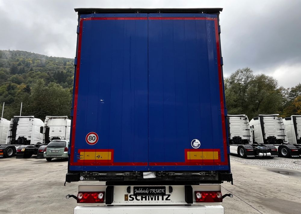 Schmitz Cargobull Firanka Standard Coilmulde // 9m // Oś podnoszona // Osie Schmitz // - Тентованный полуприцеп: фото 2 Schmitz Cargobull Firanka Standard Coilmulde // 9m // Oś podnoszona // Osie Schmitz // - Тентованный полуприцеп: фото 2