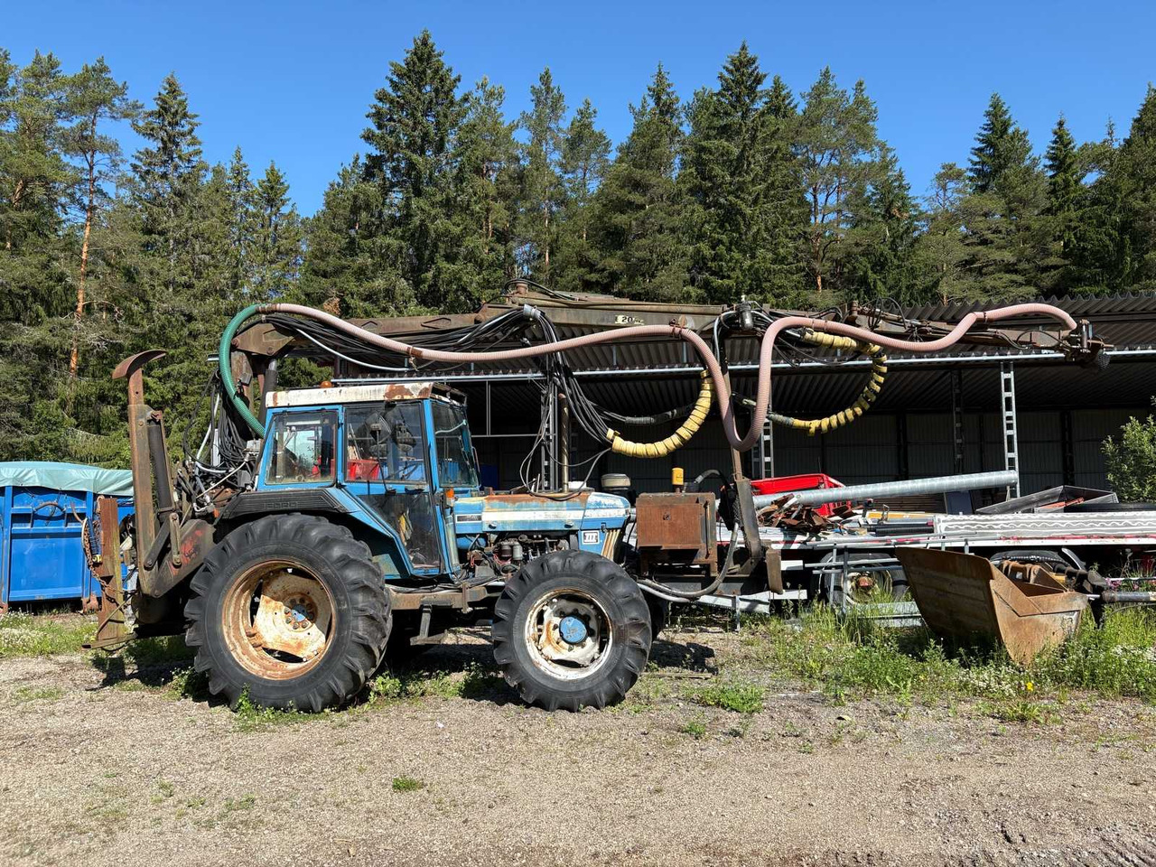 Rock drill Doofor DF530S and Tractor Ford New Holland 5610 - Буровая машина: фото 1 Rock drill Doofor DF530S and Tractor Ford New Holland 5610 - Буровая машина: фото 1