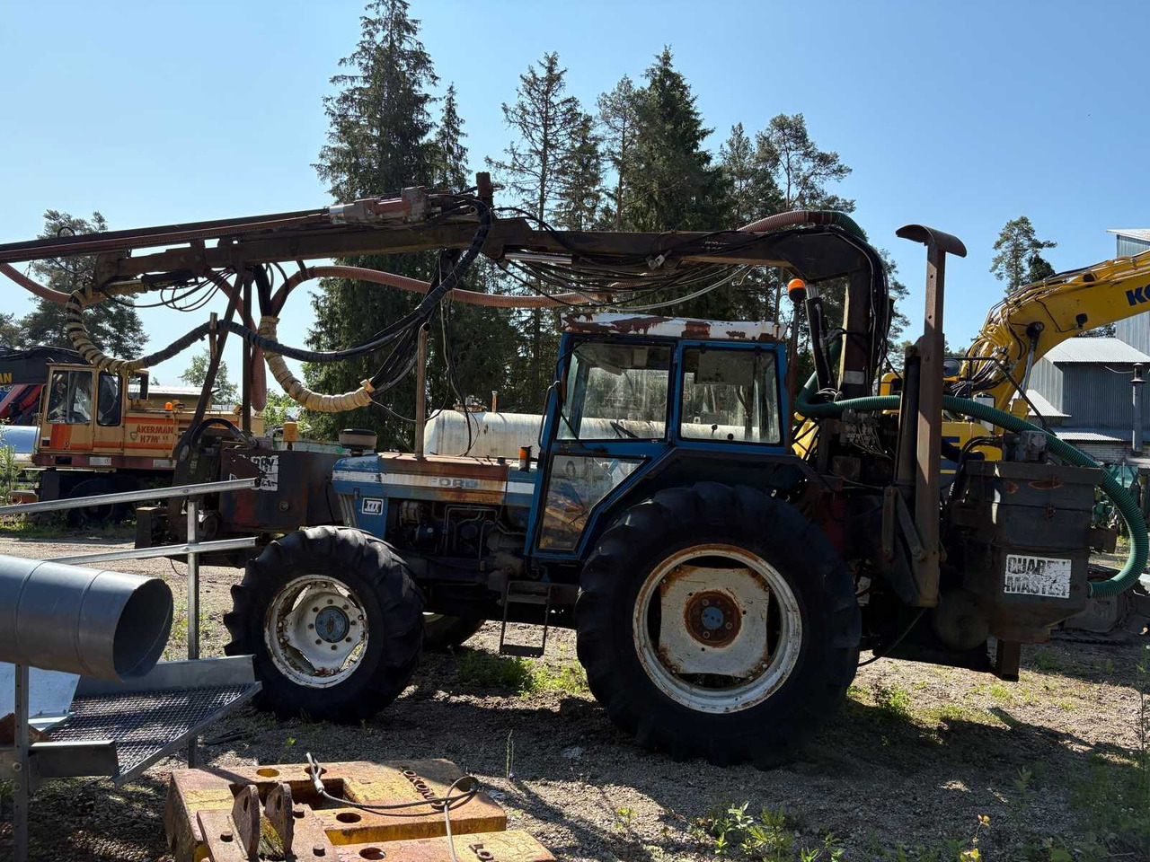 Rock drill Doofor DF530S and Tractor Ford New Holland 5610 - Буровая машина: фото 5 Rock drill Doofor DF530S and Tractor Ford New Holland 5610 - Буровая машина: фото 5