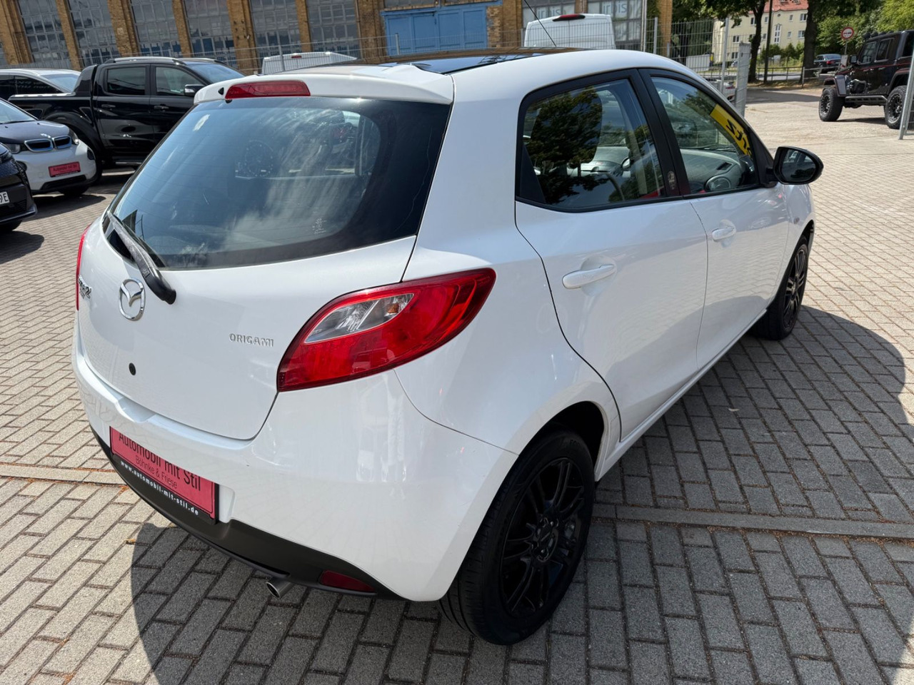 Mazda 2 Lim. 1.3 Origami 5 TÜER KLIMA SHZ TÜV NEU - Легковой автомобиль: фото 4 Mazda 2 Lim. 1.3 Origami 5 TÜER KLIMA SHZ TÜV NEU - Легковой автомобиль: фото 4