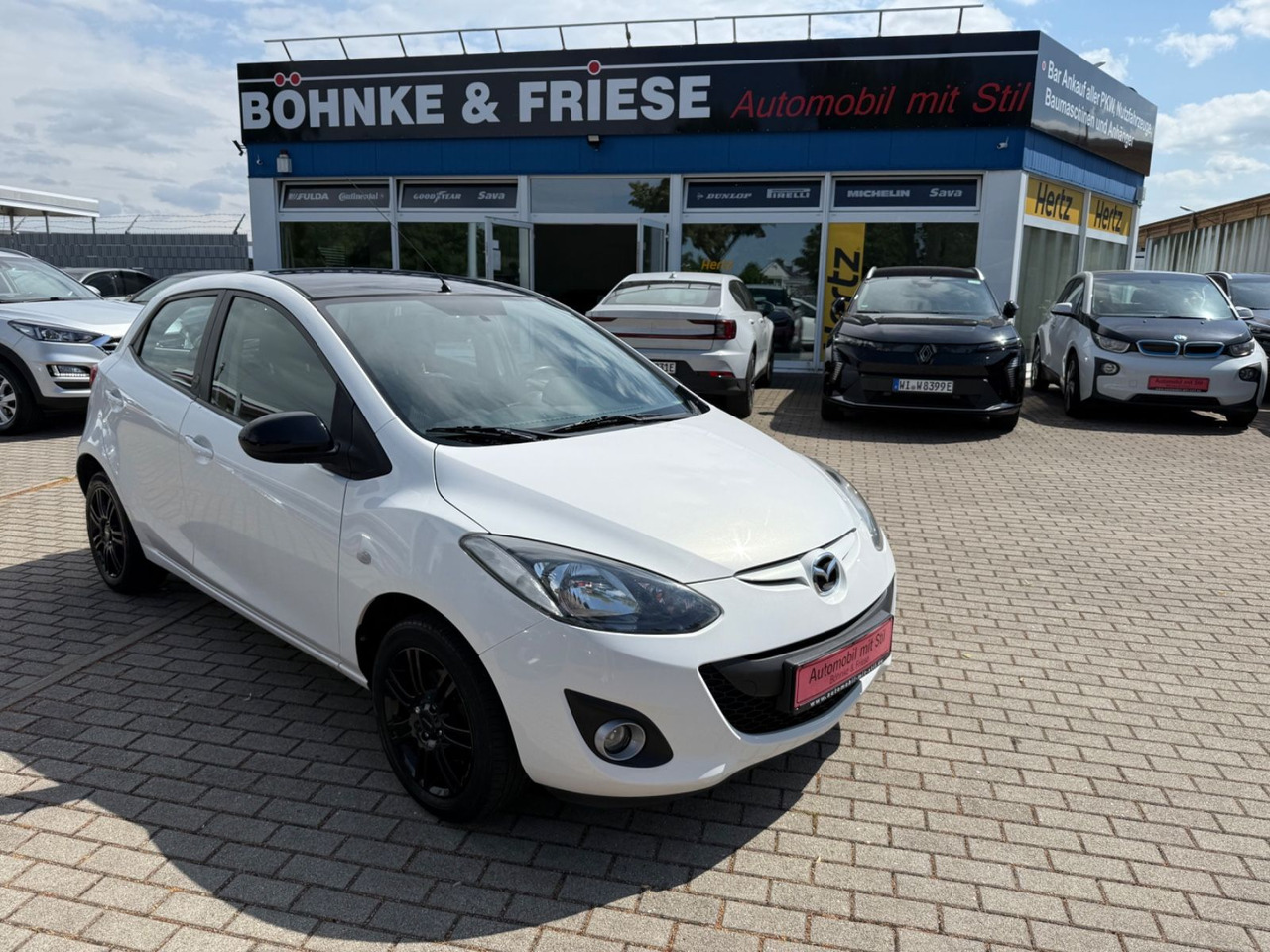 Mazda 2 Lim. 1.3 Origami 5 TÜER KLIMA SHZ TÜV NEU - Легковой автомобиль: фото 1 Mazda 2 Lim. 1.3 Origami 5 TÜER KLIMA SHZ TÜV NEU - Легковой автомобиль: фото 1