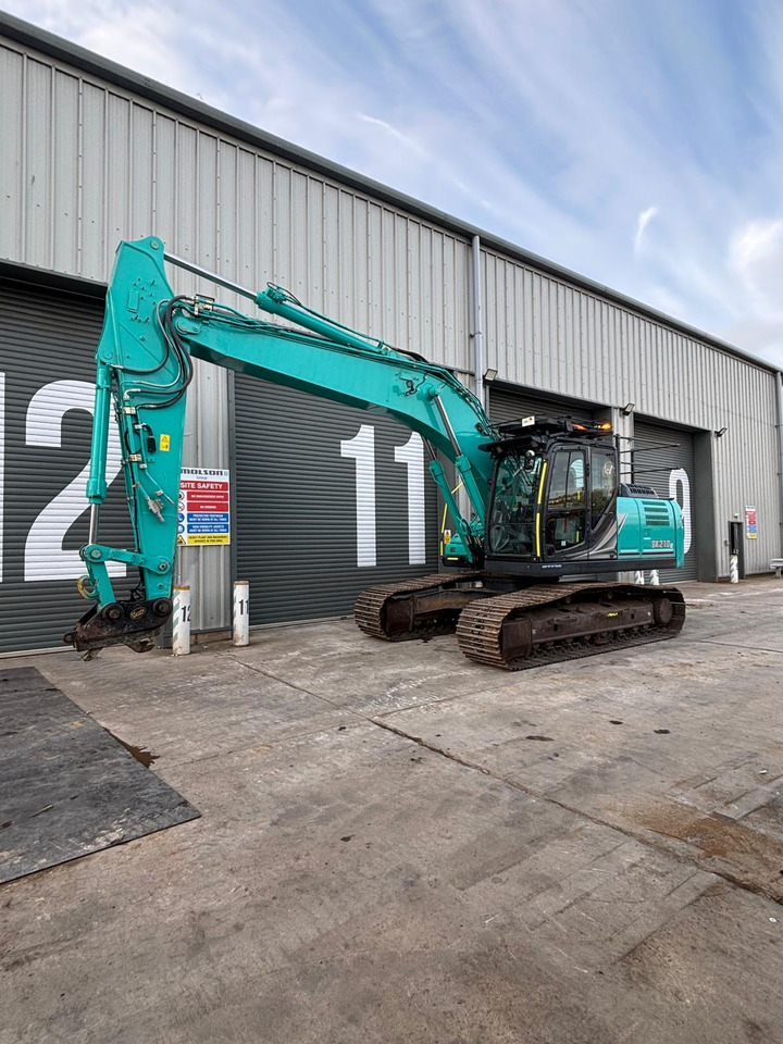 Kobelco SK210LC-11 - Гусеничный экскаватор: фото 1 Kobelco SK210LC-11 - Гусеничный экскаватор: фото 1