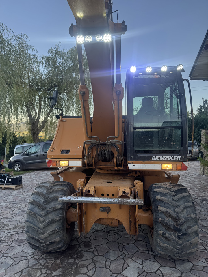 Колёсный экскаватор Case WX145: фото 12