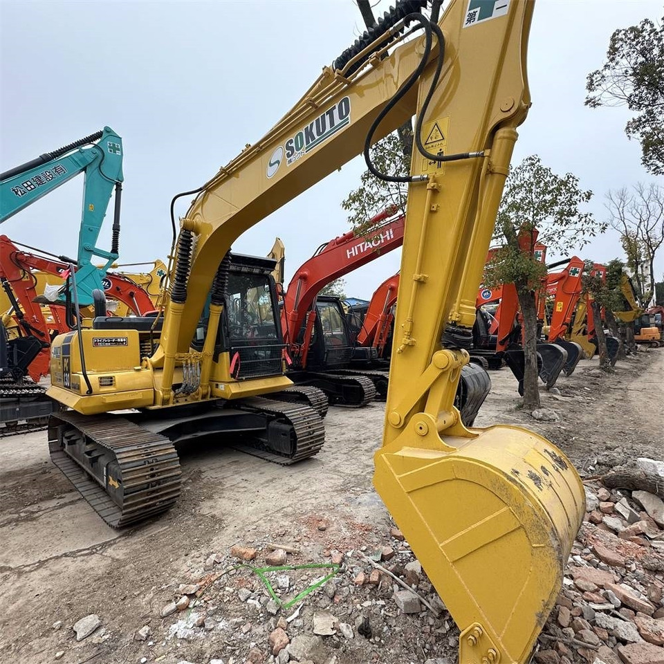 Komatsu PC 130-7 - Гусеничный экскаватор: фото 1 Komatsu PC 130-7 - Гусеничный экскаватор: фото 1
