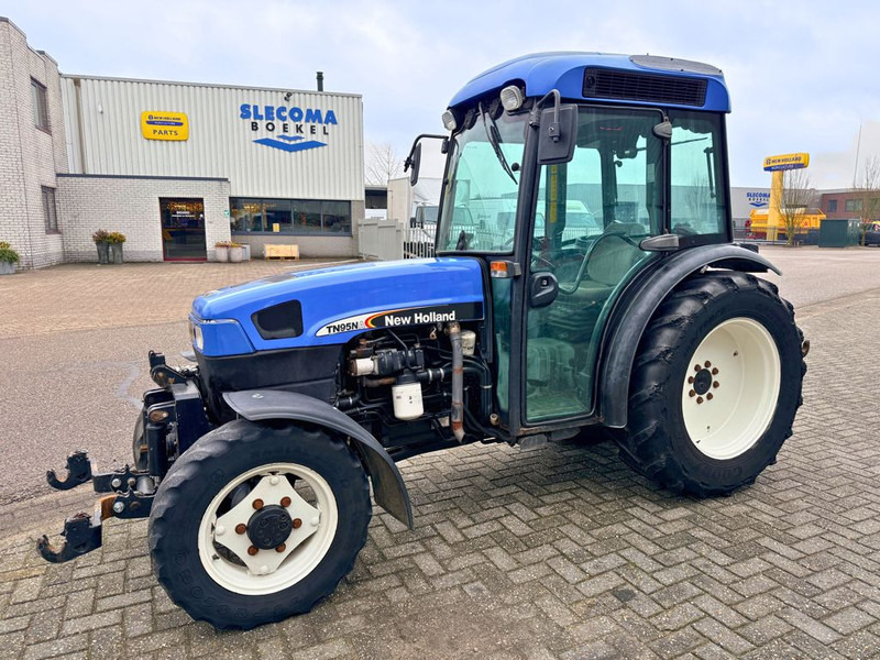 New Holland TN95NA Smalspoortrekker - Минитрактор: фото 1 New Holland TN95NA Smalspoortrekker - Минитрактор: фото 1