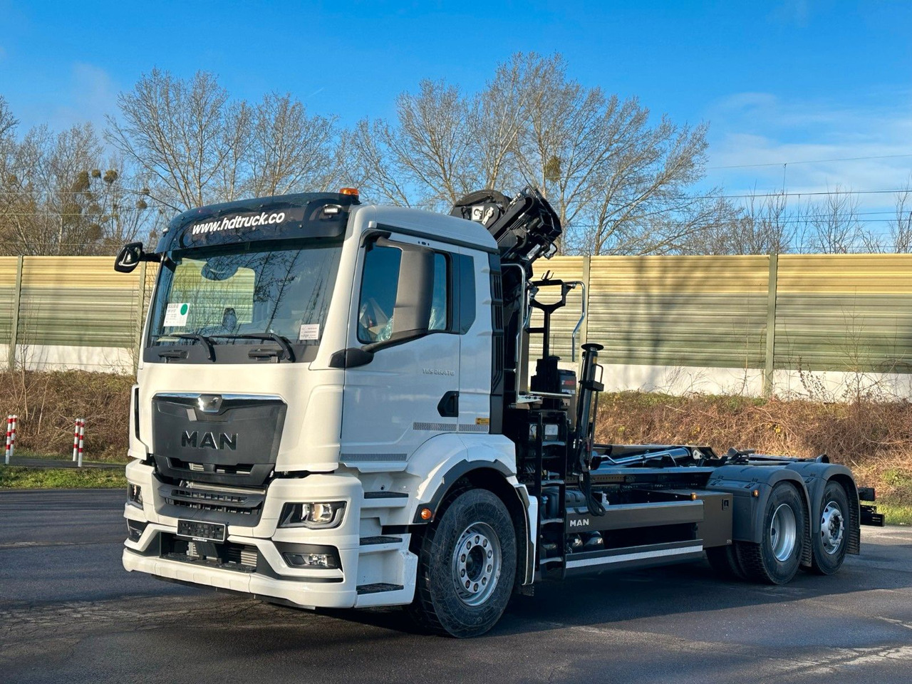 MAN TGS 26.470 6x2 Abrollkipper + Kran Hiab 138-3 - Крюковой мультилифт, Автоманипулятор: фото 2 MAN TGS 26.470 6x2 Abrollkipper + Kran Hiab 138-3 - Крюковой мультилифт, Автоманипулятор: фото 2