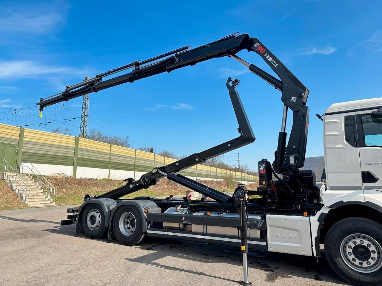 MAN TGS 26.470 6x2 Abrollkipper + Kran Hiab 228-4 - Крюковой мультилифт, Автоманипулятор: фото 2 MAN TGS 26.470 6x2 Abrollkipper + Kran Hiab 228-4 - Крюковой мультилифт, Автоманипулятор: фото 2