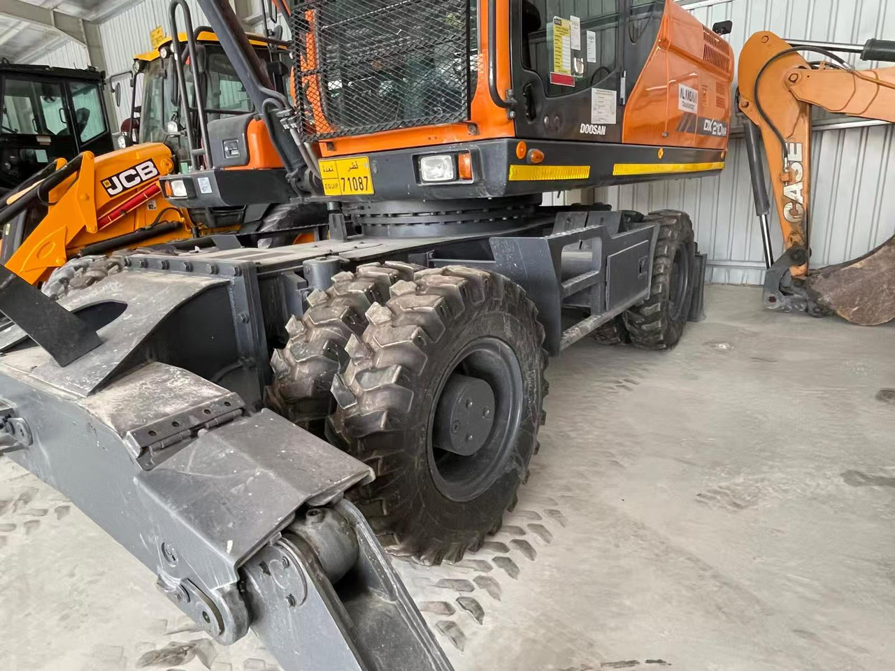 DOOSAN DX210 - Колёсный экскаватор: фото 4 DOOSAN DX210 - Колёсный экскаватор: фото 4