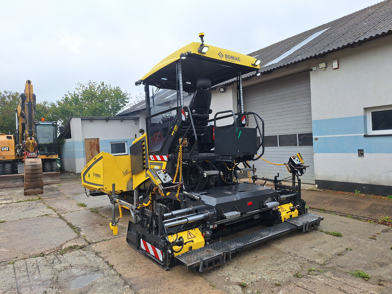 Bomag Bf 300C-3 - Асфальтоукладчик: фото 4 Bomag Bf 300C-3 - Асфальтоукладчик: фото 4