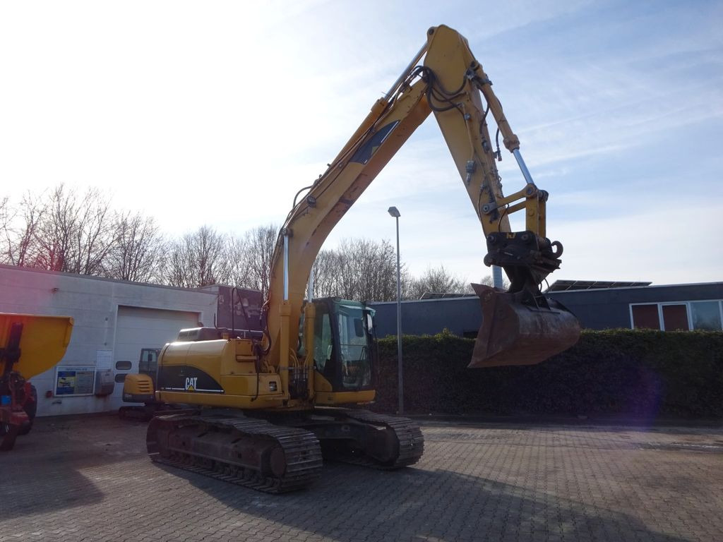 CAT 318CL - Гусеничный экскаватор: фото 4 CAT 318CL - Гусеничный экскаватор: фото 4