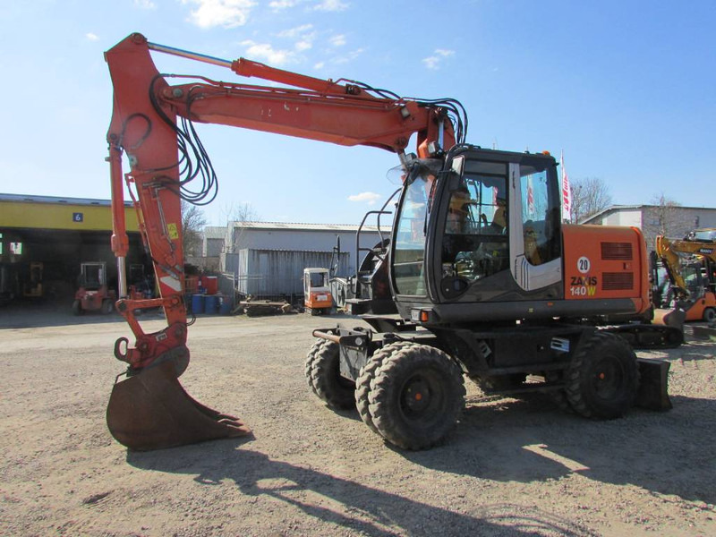 Hitachi ZX 140 W-3 Mobilbagger 48.000 EUR / Klima - Колёсный экскаватор: фото 1 Hitachi ZX 140 W-3 Mobilbagger 48.000 EUR / Klima - Колёсный экскаватор: фото 1