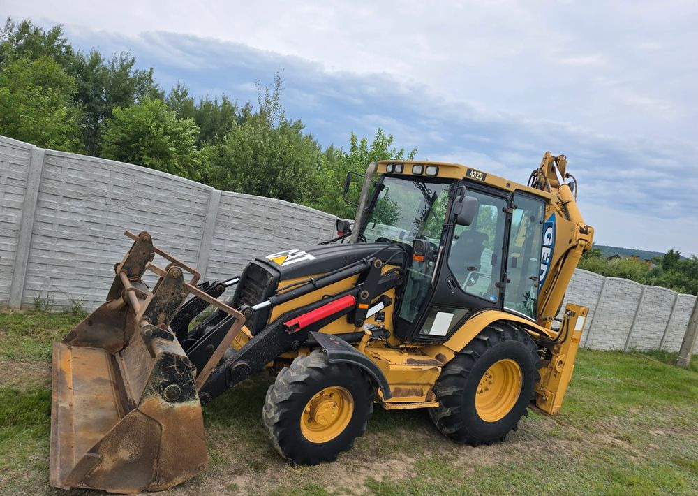 Caterpillar - Экскаватор-погрузчик: фото 1 Caterpillar - Экскаватор-погрузчик: фото 1