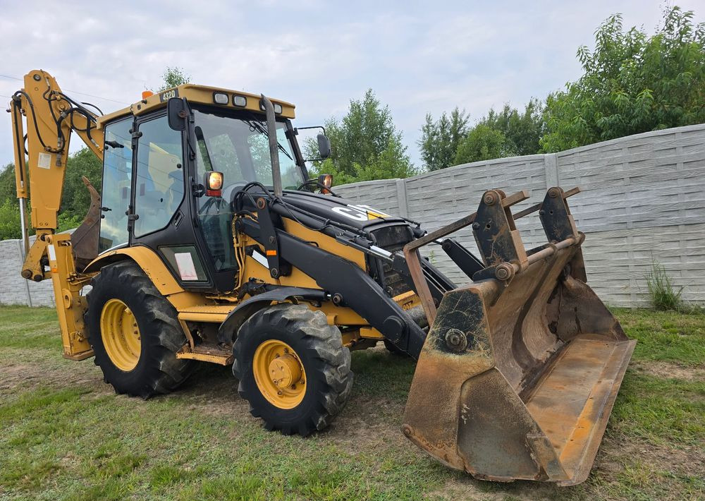 Caterpillar - Экскаватор-погрузчик: фото 2 Caterpillar - Экскаватор-погрузчик: фото 2
