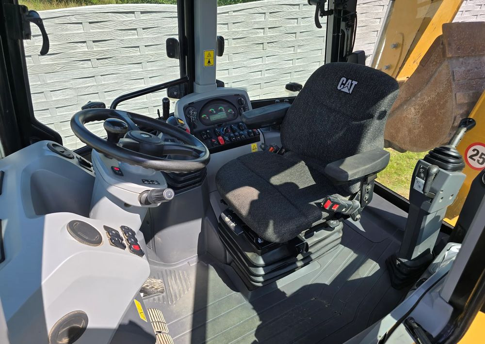 Caterpillar - Экскаватор-погрузчик: фото 3 Caterpillar - Экскаватор-погрузчик: фото 3