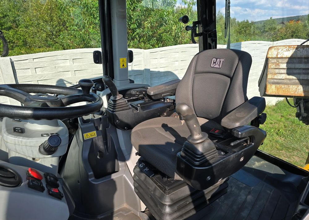 Caterpillar - Экскаватор-погрузчик: фото 3 Caterpillar - Экскаватор-погрузчик: фото 3