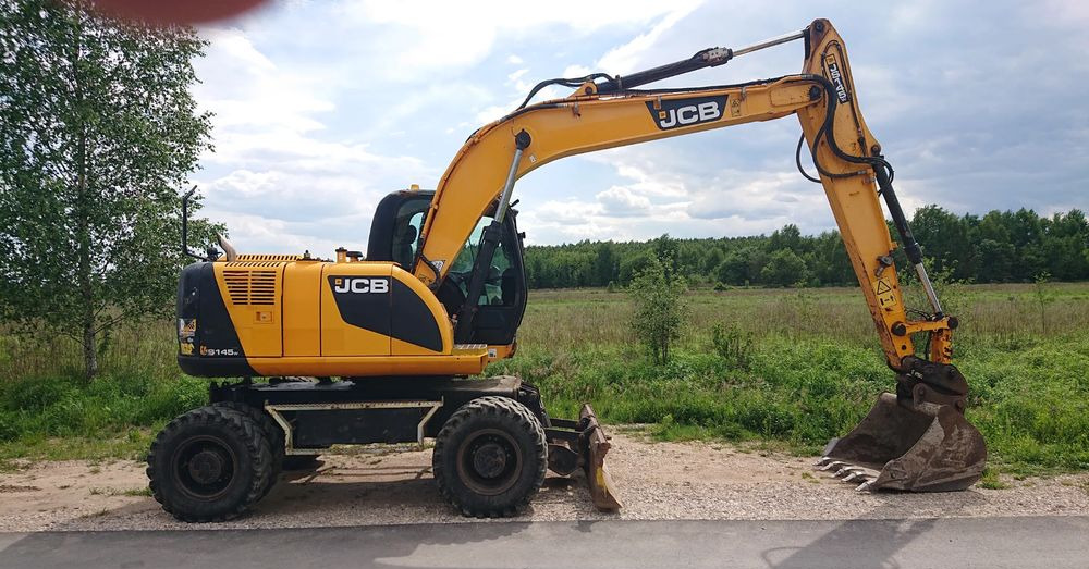 JCB - Колёсный экскаватор: фото 1 JCB - Колёсный экскаватор: фото 1