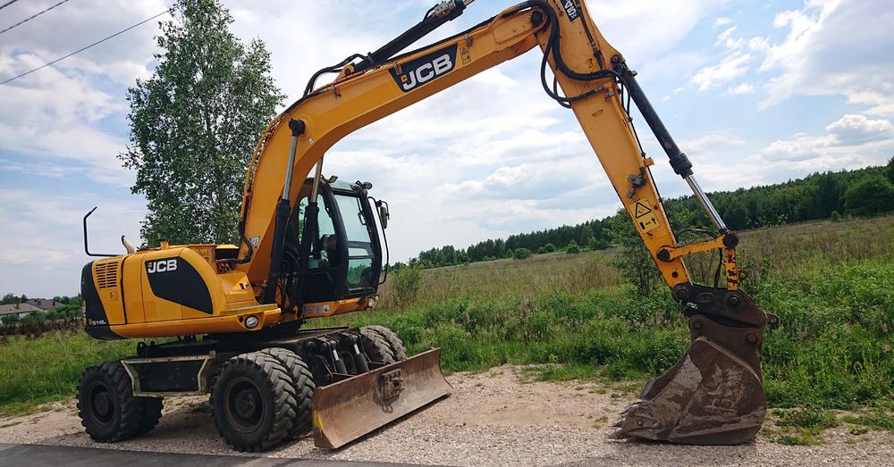 JCB - Колёсный экскаватор: фото 2 JCB - Колёсный экскаватор: фото 2