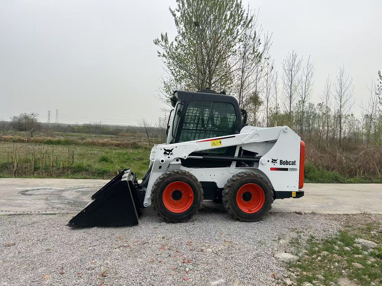 BOBCAT S550 - Мини-погрузчик с бортовым поворотом: фото 3 BOBCAT S550 - Мини-погрузчик с бортовым поворотом: фото 3