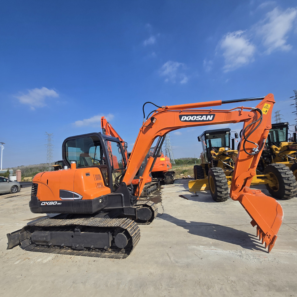 Doosan DX60 - Мини-экскаватор: фото 3 Doosan DX60 - Мини-экскаватор: фото 3