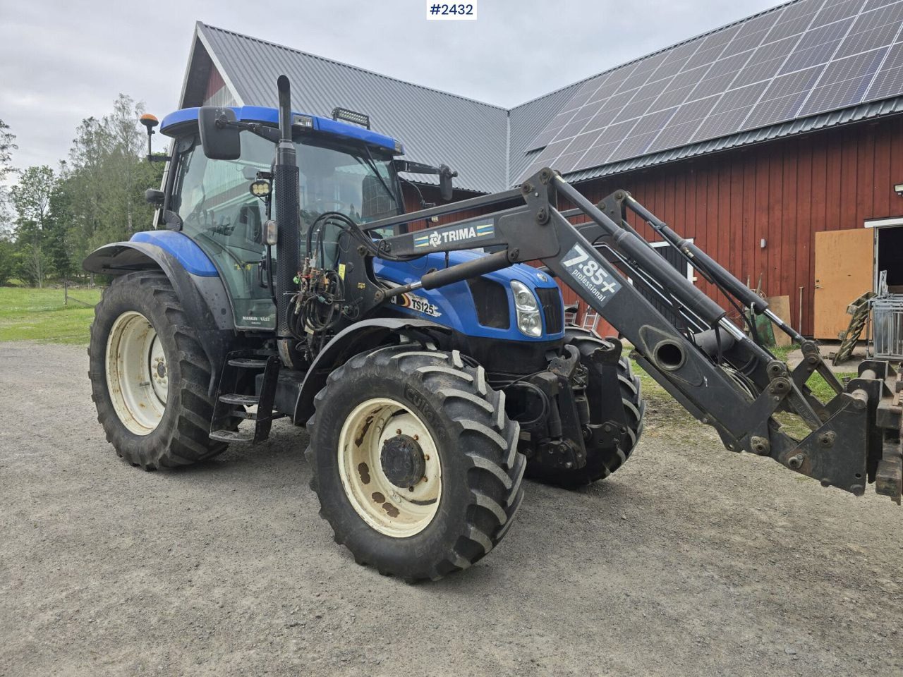 New Holland TS 125A med Frontlastare - Трактор: фото 2 New Holland TS 125A med Frontlastare - Трактор: фото 2