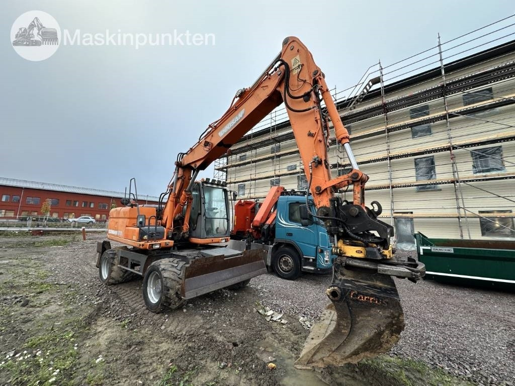 Doosan DX 140 W med vagn och redskap  - Колёсный экскаватор: фото 2 Doosan DX 140 W med vagn och redskap  - Колёсный экскаватор: фото 2