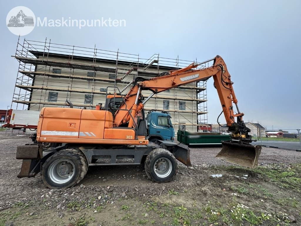 Doosan DX 140 W med vagn och redskap  - Колёсный экскаватор: фото 3 Doosan DX 140 W med vagn och redskap  - Колёсный экскаватор: фото 3