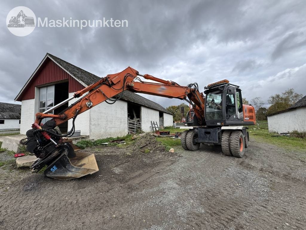 Hitachi ZX 140 W-3 - Колёсный экскаватор: фото 1 Hitachi ZX 140 W-3 - Колёсный экскаватор: фото 1