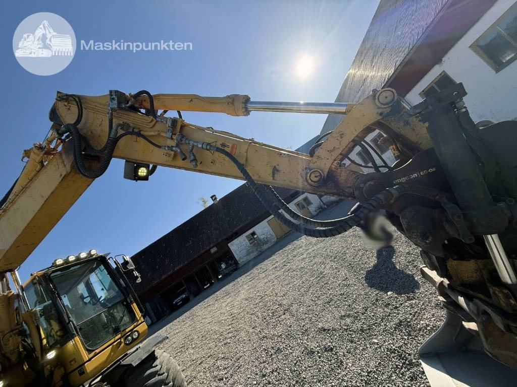 Колёсный экскаватор Komatsu PW 148-10: фото 16