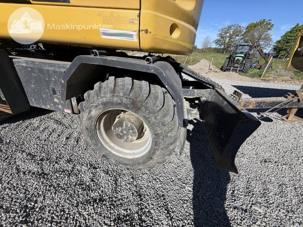 Колёсный экскаватор Komatsu PW 148-10: фото 37