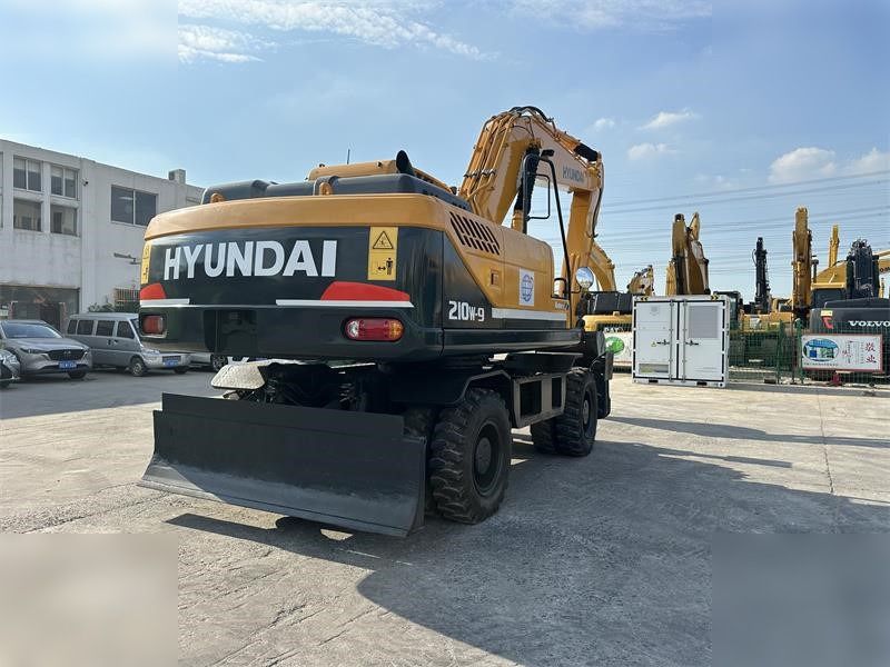 HYUNDAI ROBEX 210W-9 - Колёсный экскаватор: фото 2 HYUNDAI ROBEX 210W-9 - Колёсный экскаватор: фото 2