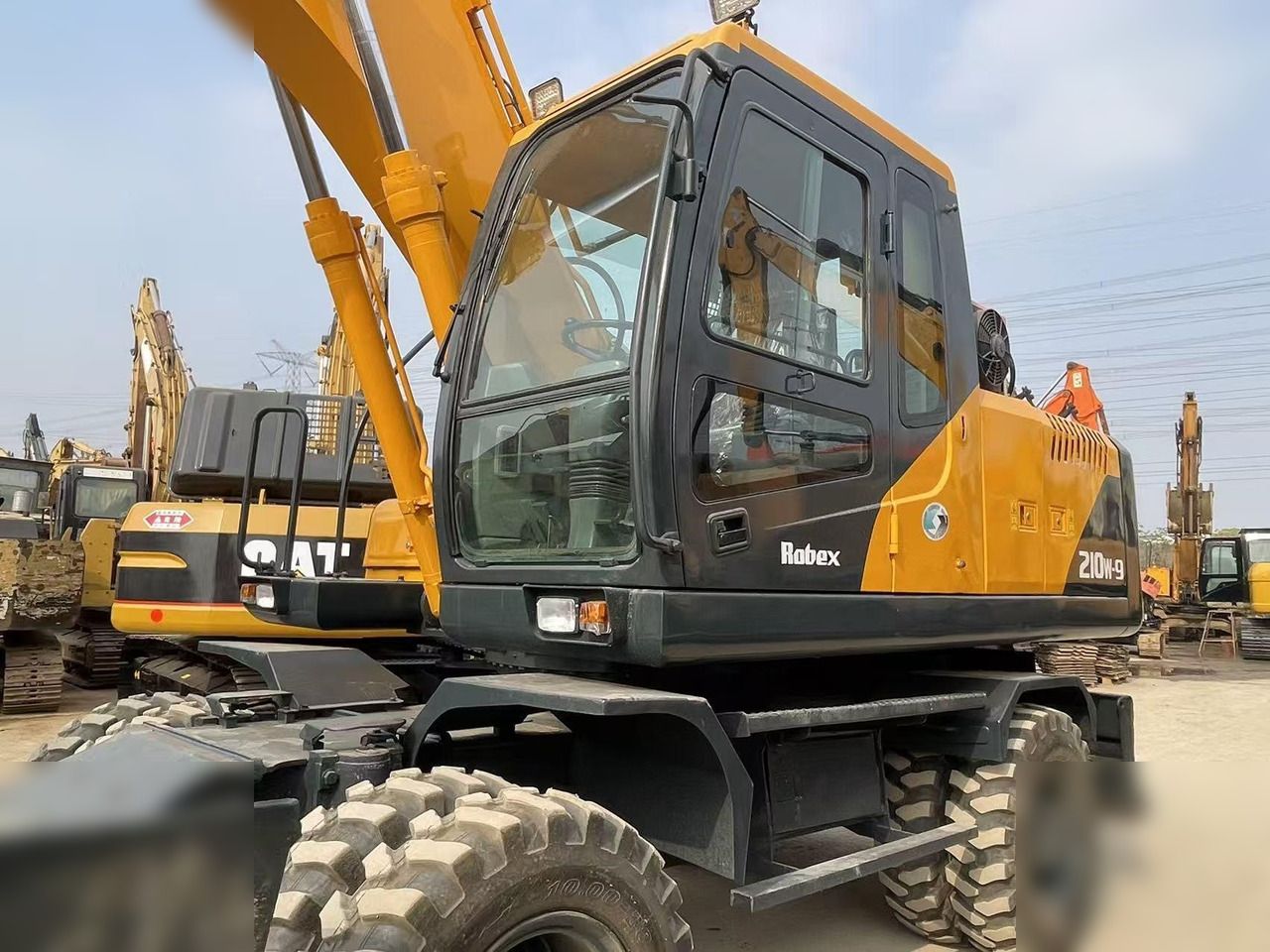 HYUNDAI ROBEX 210W-9 - Колёсный экскаватор: фото 4 HYUNDAI ROBEX 210W-9 - Колёсный экскаватор: фото 4