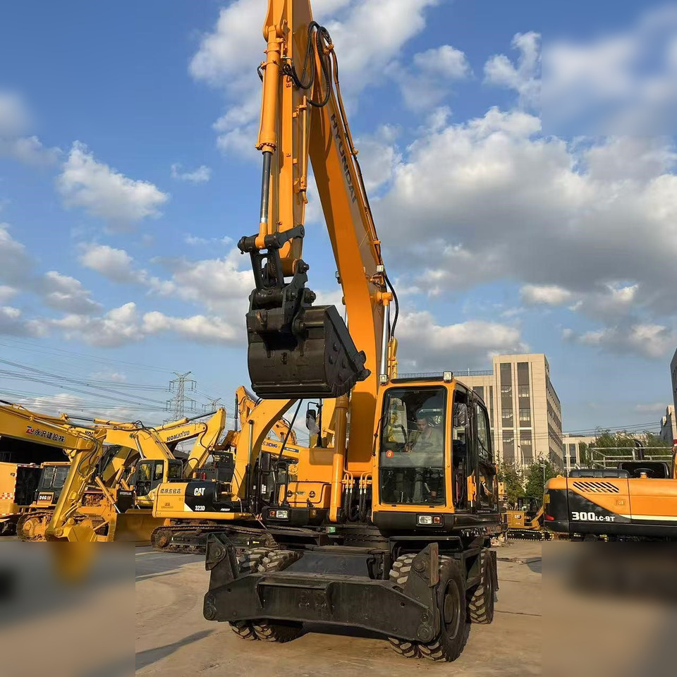 HYUNDAI ROBEX 210W-9 - Колёсный экскаватор: фото 2 HYUNDAI ROBEX 210W-9 - Колёсный экскаватор: фото 2