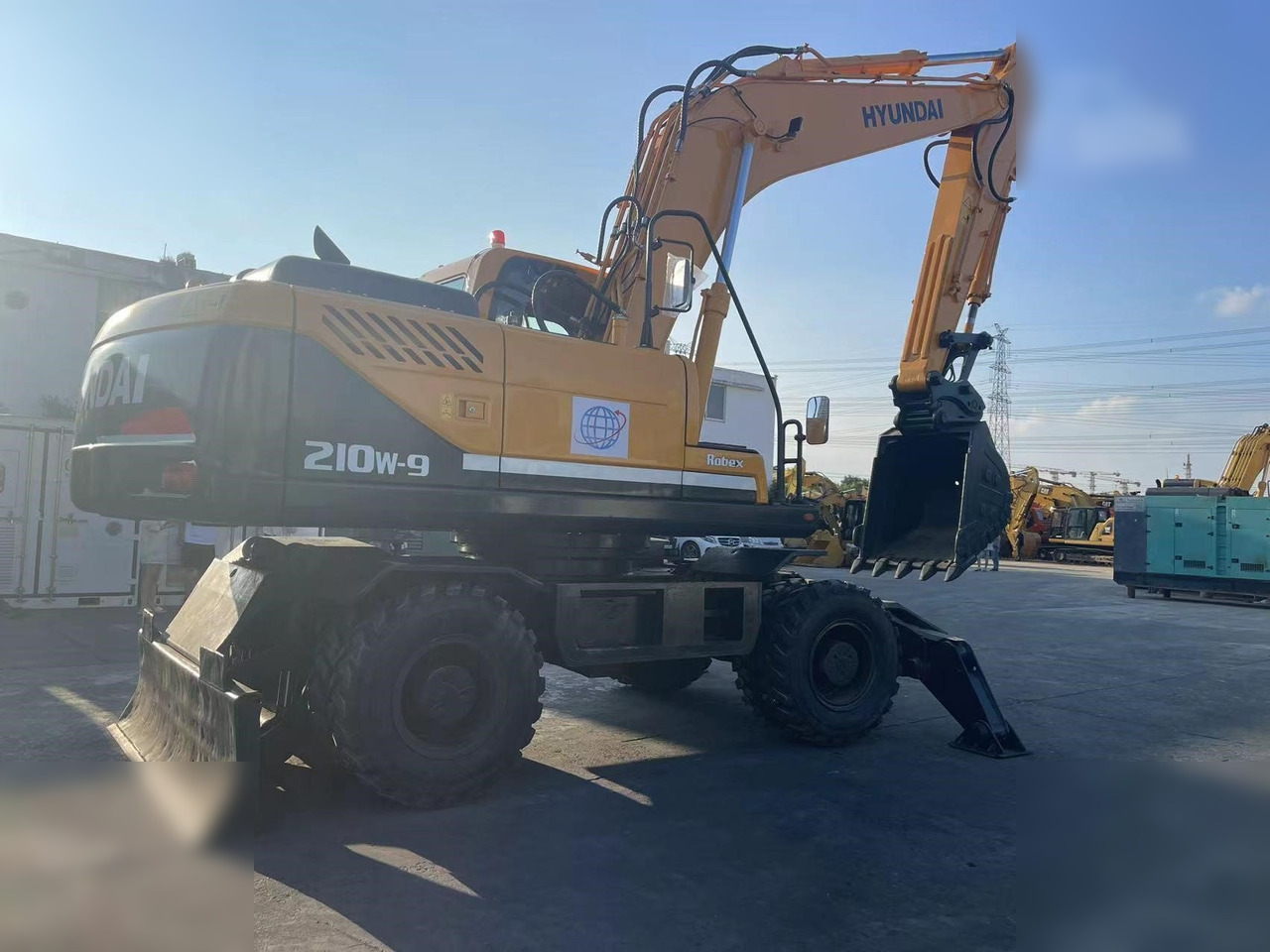 HYUNDAI ROBEX 210W-9 - Колёсный экскаватор: фото 2 HYUNDAI ROBEX 210W-9 - Колёсный экскаватор: фото 2