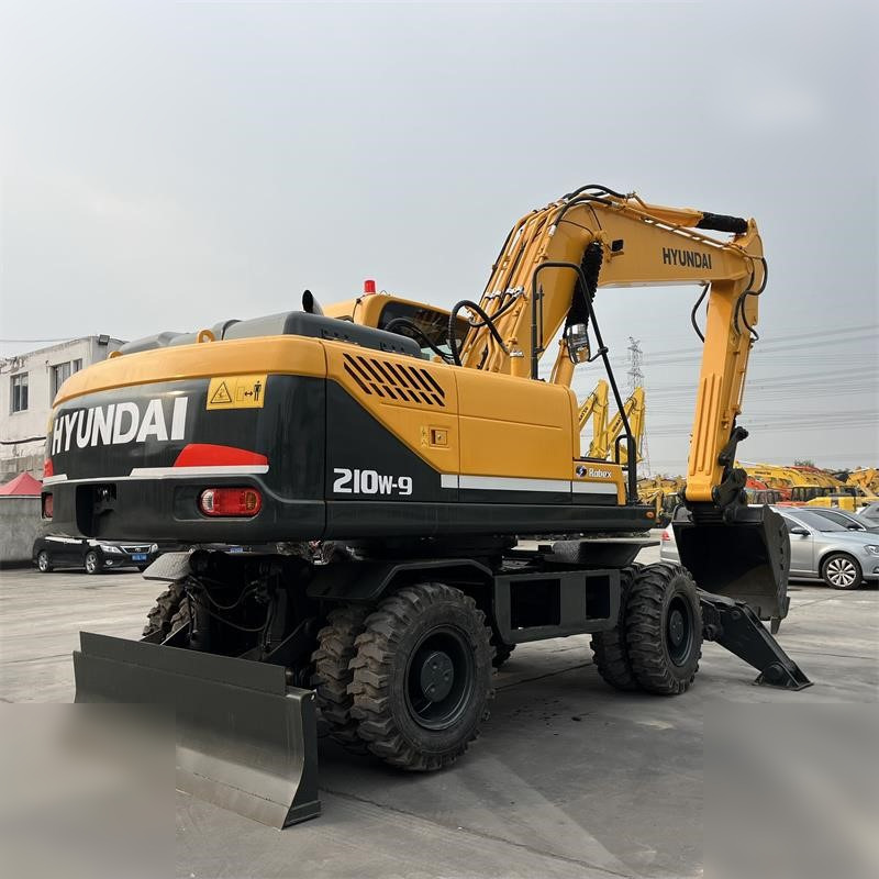 HYUNDAI ROBEX 210W-9 - Колёсный экскаватор: фото 3 HYUNDAI ROBEX 210W-9 - Колёсный экскаватор: фото 3
