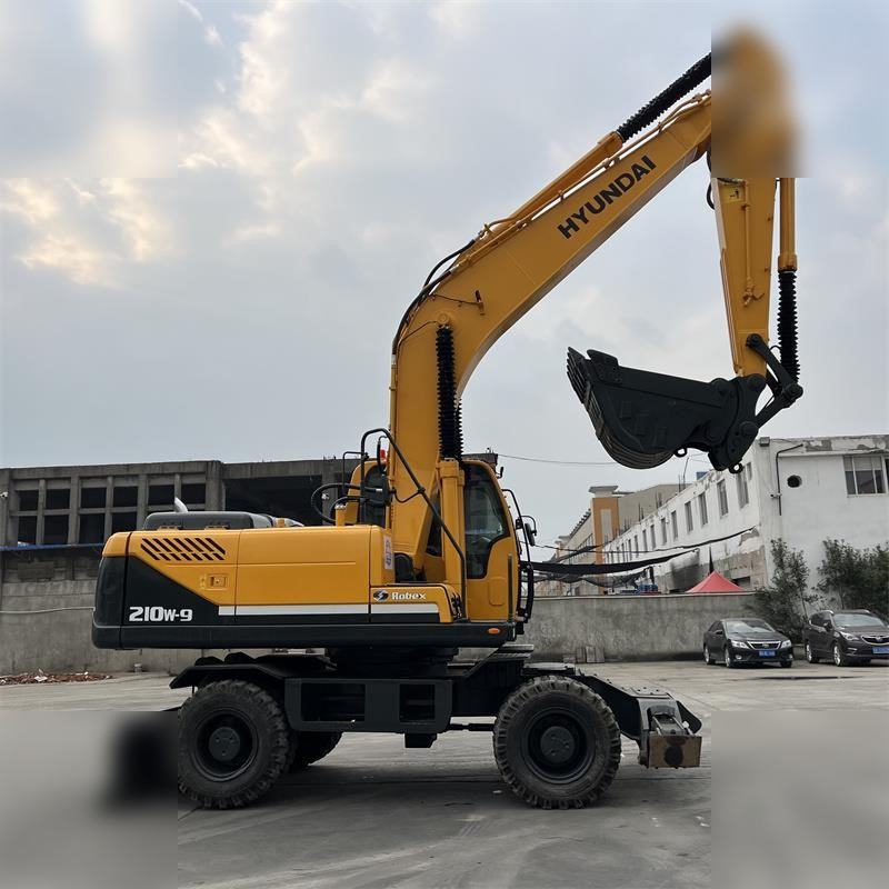 HYUNDAI ROBEX 210W-9 - Колёсный экскаватор: фото 2 HYUNDAI ROBEX 210W-9 - Колёсный экскаватор: фото 2