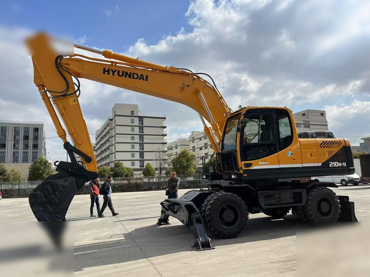 HYUNDAI ROBEX 210W-9 - Колёсный экскаватор: фото 2 HYUNDAI ROBEX 210W-9 - Колёсный экскаватор: фото 2