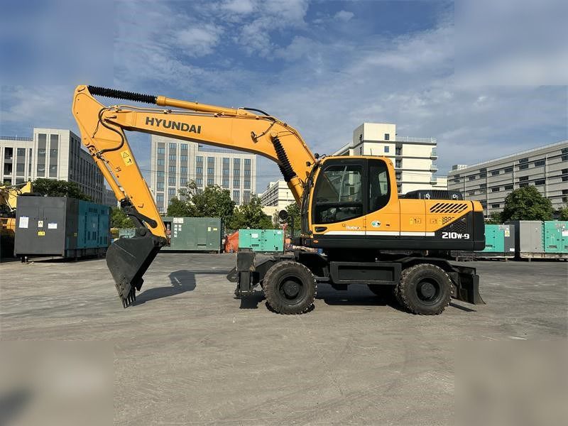 HYUNDAI ROBEX 210W-9 - Колёсный экскаватор: фото 1 HYUNDAI ROBEX 210W-9 - Колёсный экскаватор: фото 1