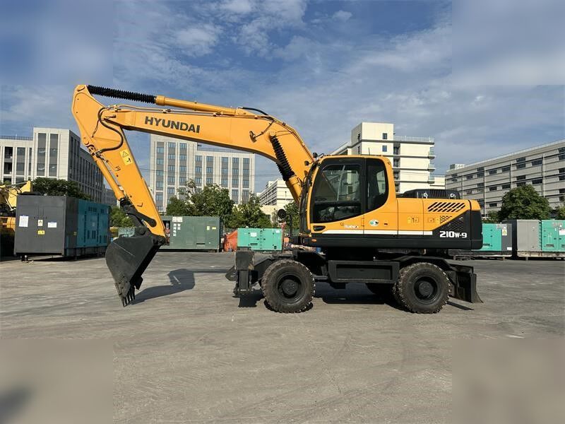 HYUNDAI ROBEX 210W-9 - Колёсный экскаватор: фото 1 HYUNDAI ROBEX 210W-9 - Колёсный экскаватор: фото 1
