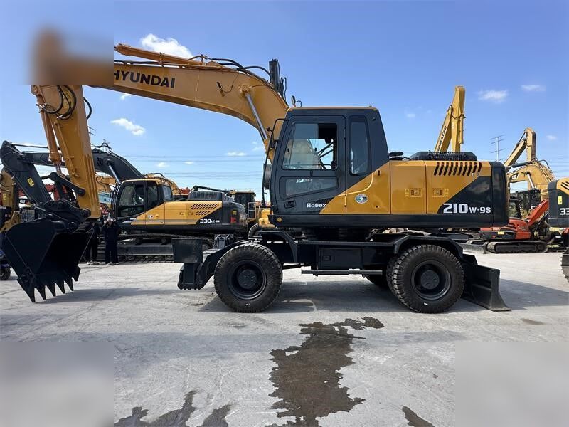 HYUNDAI ROBEX 210W-9S - Колёсный экскаватор: фото 1 HYUNDAI ROBEX 210W-9S - Колёсный экскаватор: фото 1