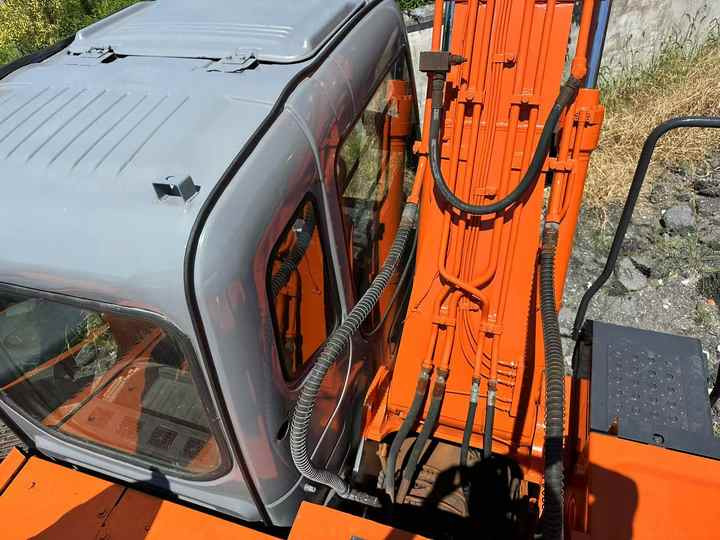 Used Wheel Excavator Hitachi ZX 130W Made in Japan 13ton Hitachi Zx130w Wheel Excavator Price Used Hitachi Zx130 Excavator SALE - Колёсный экскаватор: фото 5 Used Wheel Excavator Hitachi ZX 130W Made in Japan 13ton Hitachi Zx130w Wheel Excavator Price Used Hitachi Zx130 Excavator SALE - Колёсный экскаватор: фото 5