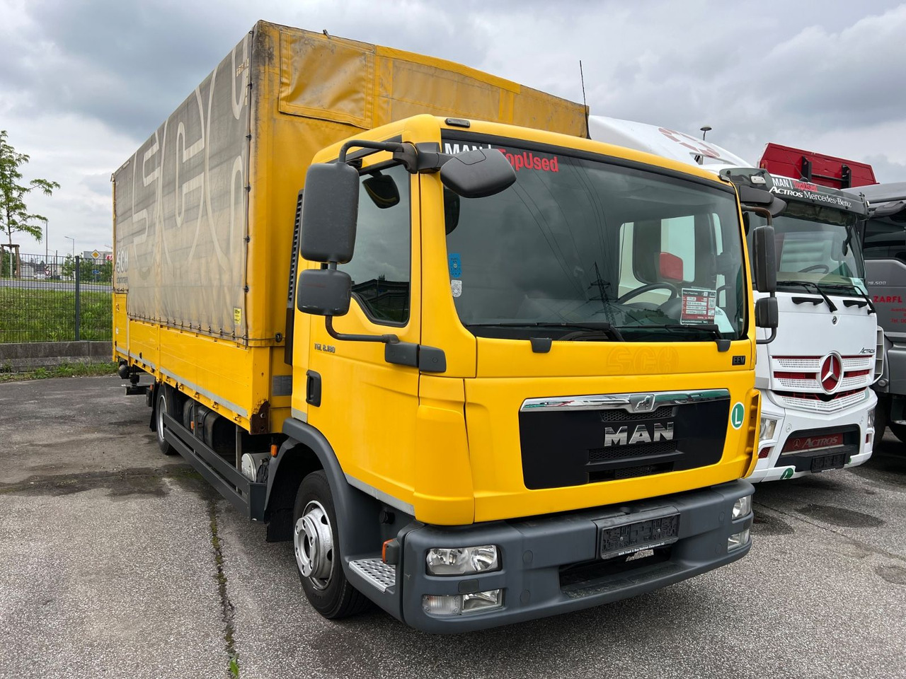 MAN TGL 8 180 - Тентованный грузовик: фото 2 MAN TGL 8 180 - Тентованный грузовик: фото 2