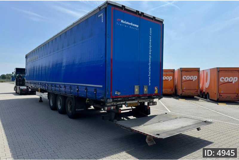 Krone SD / Sideboards / Drum brakes / DHOLLANDIA 2000KG - Тентованный полуприцеп: фото 3 Krone SD / Sideboards / Drum brakes / DHOLLANDIA 2000KG - Тентованный полуприцеп: фото 3