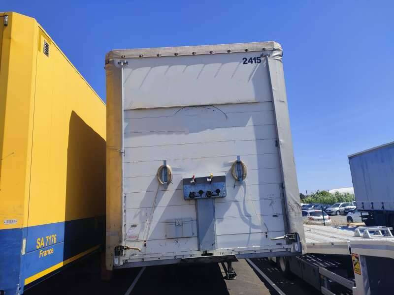 Semi-remorque 3 Essieux 38 TONNES 2 PORTES AR REHAUSSABLE BI ATTELAGE - Тентованный полуприцеп: фото 1 Semi-remorque 3 Essieux 38 TONNES 2 PORTES AR REHAUSSABLE BI ATTELAGE - Тентованный полуприцеп: фото 1